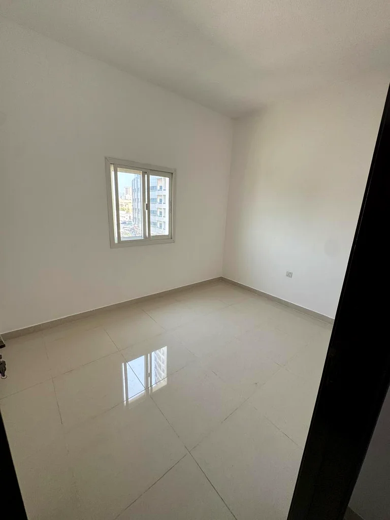 شقة مكونة من غرفتين نوم للإيجار في الرشيدية 2 في موقع متميز63720962604290114