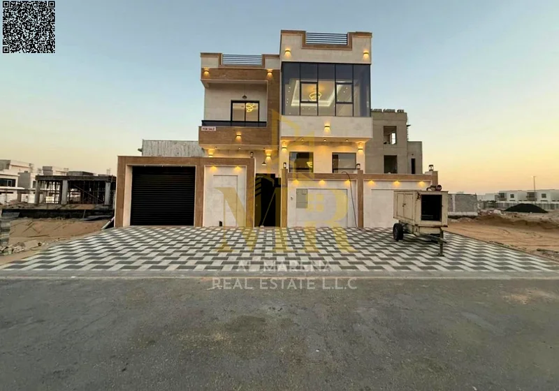 فيلا بسعر يشمل رسوم التسجيل ونقل الملكية على الشارع الرئيسي، جاهزة للسكن في أكثر مناطق عجمان رقيًا. ملكية حرة63905218395522111