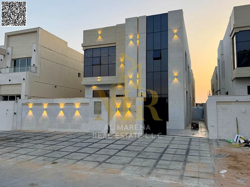 A villa with a price including registration and ownership fees on the main street, ready for occupancy in the most upscale areas of Ajman, freehold fo63904697906433114