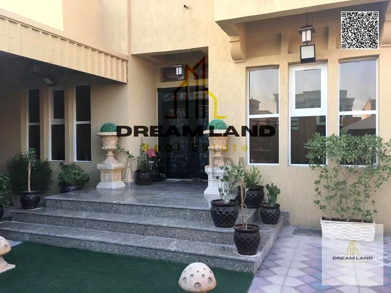 For sale - Villa in Al Rawda 2 - Ajman | Two floors | 6 master bedrooms | Majlis and hall | Spacious yard | On main street | Close to services | Freeh63878711537411110