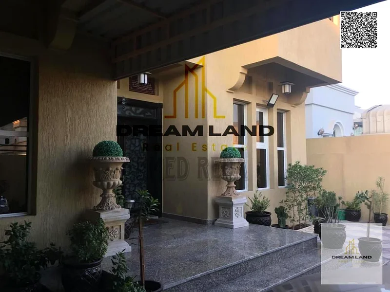 For sale - Villa in Al Rawda 2 - Ajman | Two floors | 6 master bedrooms | Majlis and hall | Spacious yard | On main street | Close to services | Freeh63878711537411111