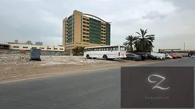For sale residential commercial land in Sharjah / Al Nahda area  A distinctive and vital location on