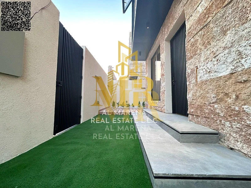 A villa with a price including registration and ownership fees on the main street, ready for occupancy in the most upscale areas of Ajman, freehold fo63882550747905113
