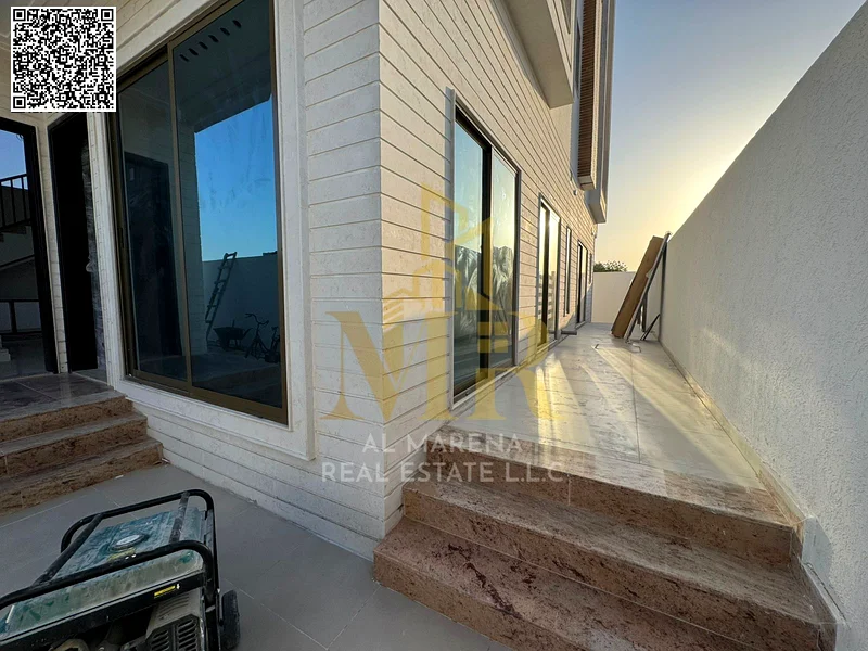 A villa with a price including registration and ownership fees on the main street, ready for occupancy in the most upscale areas of Ajman, freehold fo63904245577731114