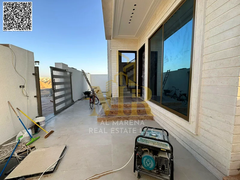 A villa with a price including registration and ownership fees on the main street, ready for occupancy in the most upscale areas of Ajman, freehold fo63904245577731113