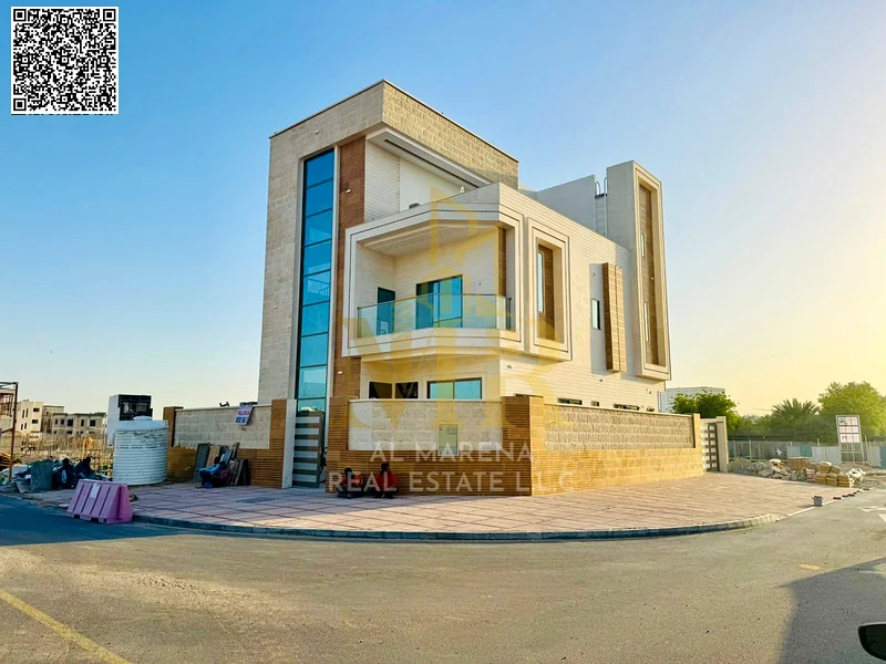 A villa with a price including registration and ownership fees on the main street, ready for occupancy in the most upscale areas of Ajman, freehold fo63904245577731110