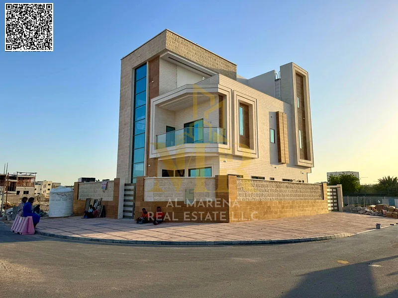 A villa with a price including registration and ownership fees on the main street, ready for occupancy in the most upscale areas of Ajman, freehold fo63904245577731112