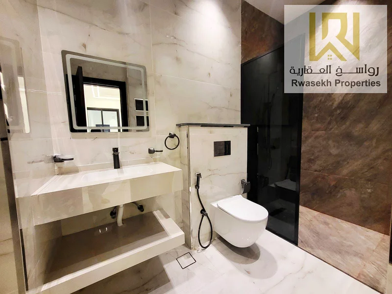 You have land for sale: ground floor + two residential investment floors in the Ajman Al Helio 1 area, on a main street, 3104 square feet, including r63882221119106114