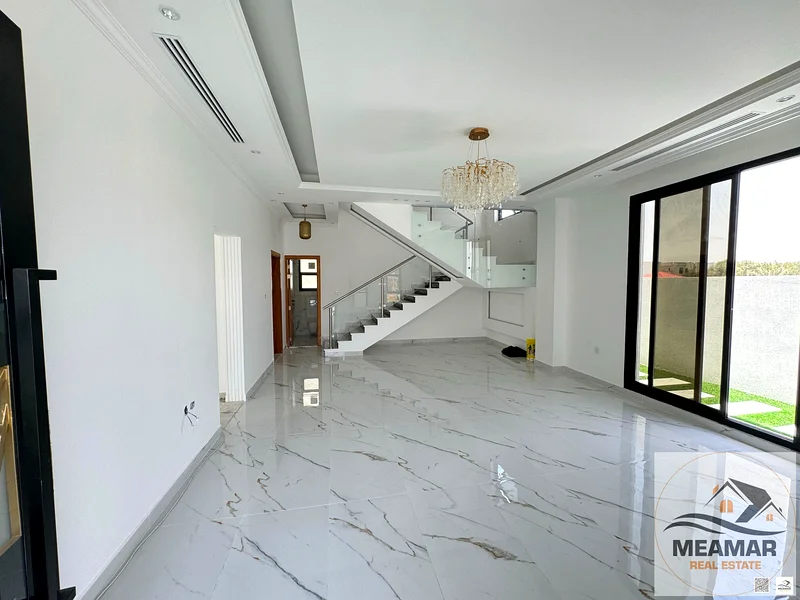 For sale, a villa, including registration and ownership fees, directly opposite the mosque, two floors, stone facade, with the possibility of easy ban63905344411011112