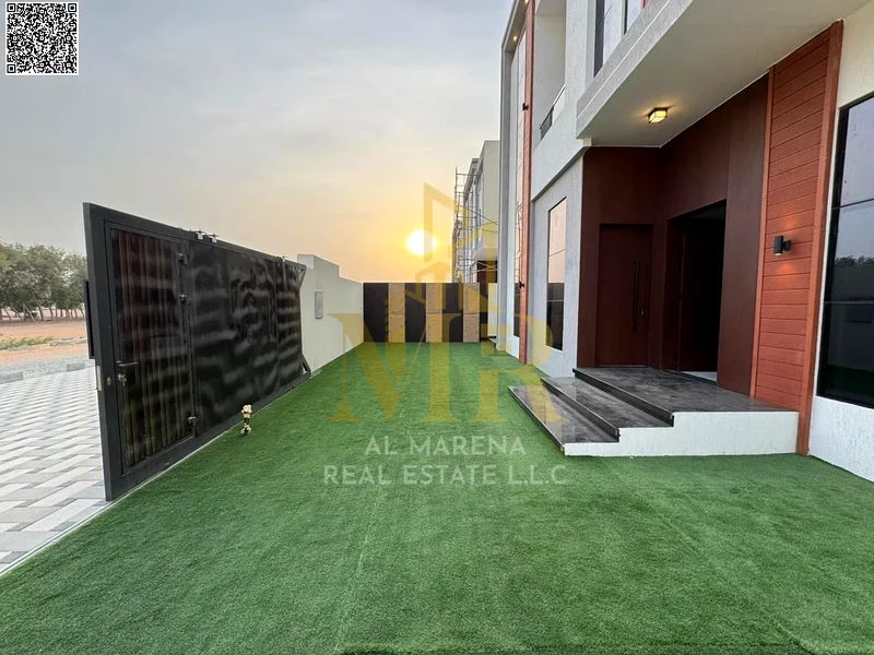 A villa with a price including registration and ownership fees on the main street, ready for occupancy in the most upscale areas of Ajman, freehold fo63892909448066114