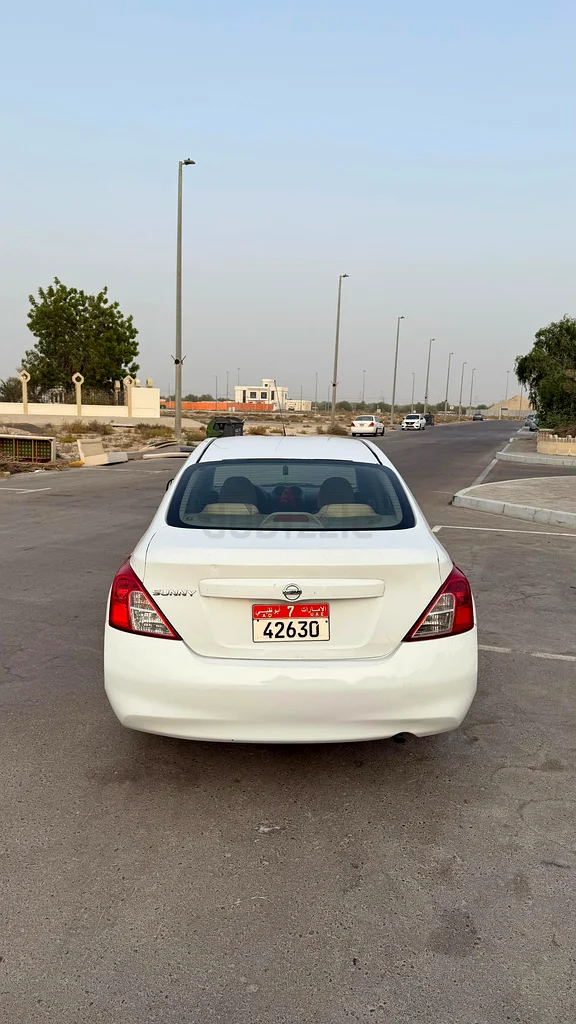 Nissan Sunny 2013 model (Indian Spec). Transmission: Automatic, Colour: White, Fuel: Petrol.63612795330051112