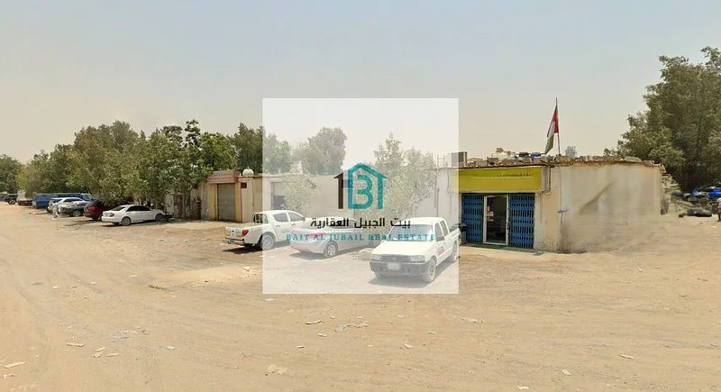 ساحة استثمارية في منطقة الساجا الصناعية - موقع زاوي متميز على طريقين رئيسيين63819129570306110