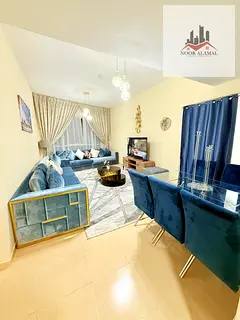 Sharjah - alkhan  - Three bedroom apartment with a living room, kitchen, and 3 bathrooms