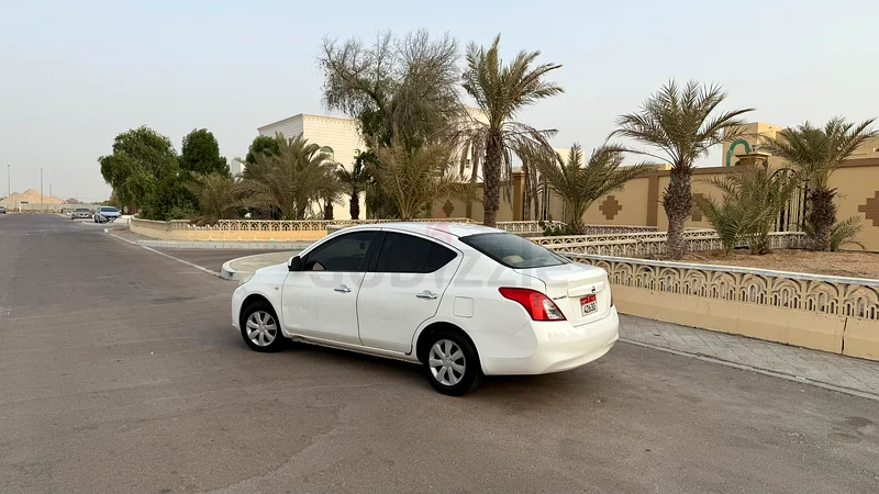 Nissan Sunny 2013 model (Indian Spec). Transmission: Automatic, Colour: White, Fuel: Petrol.63612795330051114