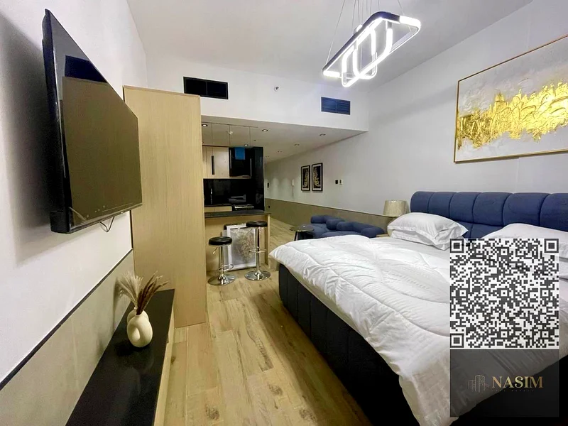 Studio for sale with a balcony in Al Nuaimiya Tower C on a main street directly from the Sharjah exit63889910371459113
