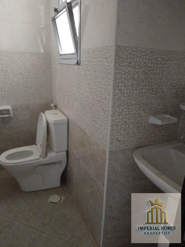 شقة مكونة من غرفتين نوم مع صالة، للإيجار السنوي، غير مفروشة، الجرف 2، عجمان63714929270785114