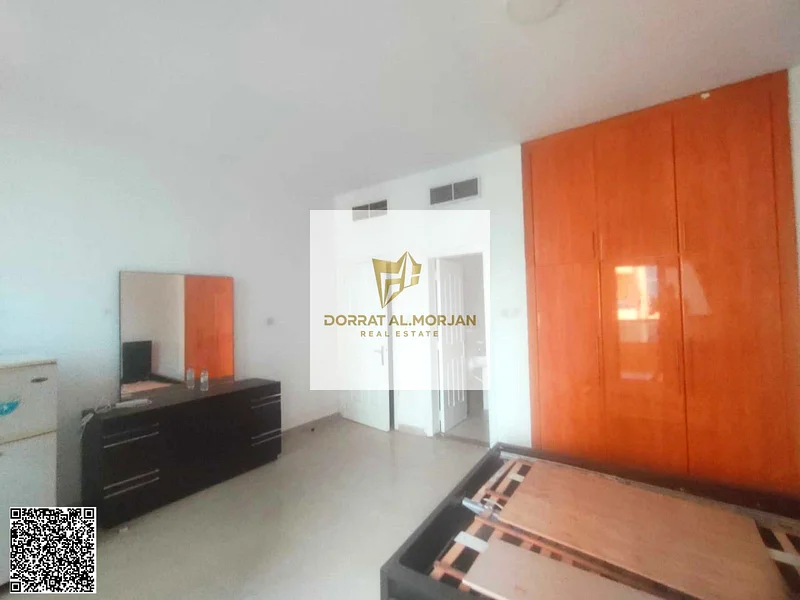 For sale in Al Khor Towers, an apartment with three rooms, a hall, and a maid's room63877884930689113
