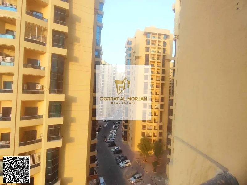 For sale in Al Khor Towers, an apartment with three rooms, a hall, and a maid's room63877884930689114