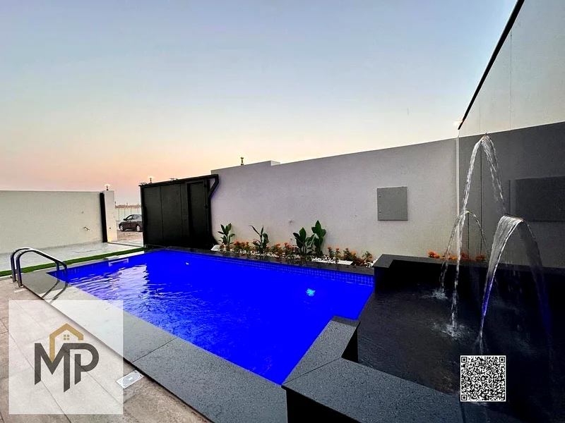 For sale - a luxury villa with a swimming pool in a prime location in Ajman, high-end finishing, modern design, including registration and swimming63906124137857112