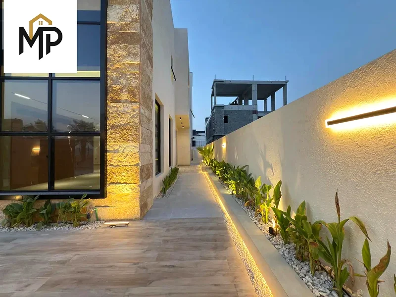 Villa - Two floors & large courtyard including fees - Close to Sheikh Mohammed bin Zayed Road - Freehold for all nationalities for life - With the pos63872690841347113