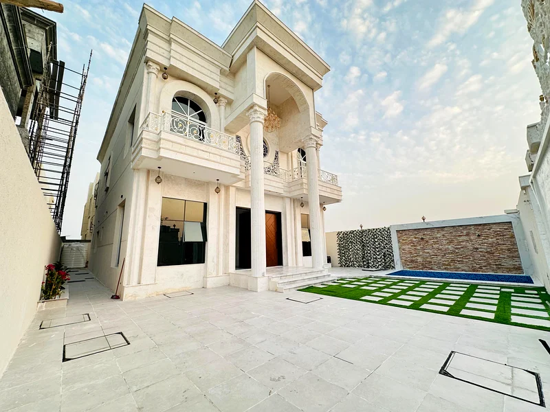 فيلا للبيع في عجمان، منطقة الحيلو، طابقين، تصميم كلاسيكي63906123940353112