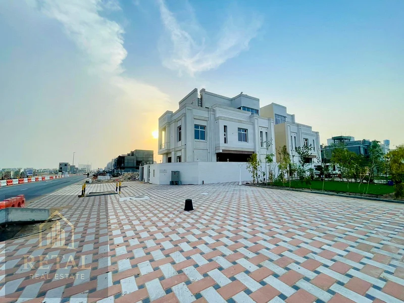 Luxury villa for sale in Al Helio Center Ajman on a prime corner location with private pool, garden, spacious layout, and full ownership services63906124026498111