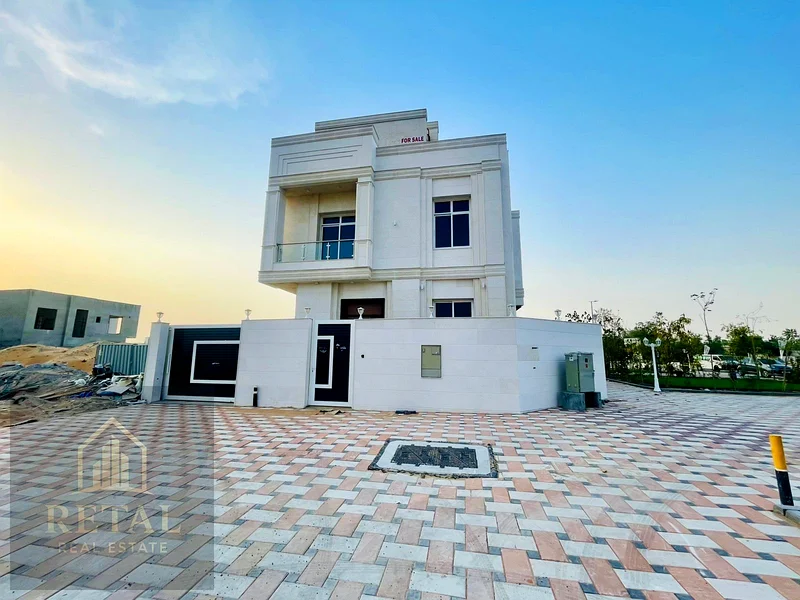 Luxury villa for sale in Al Helio Center Ajman on a prime corner location with private pool, garden, spacious layout, and full ownership services63906124026498112