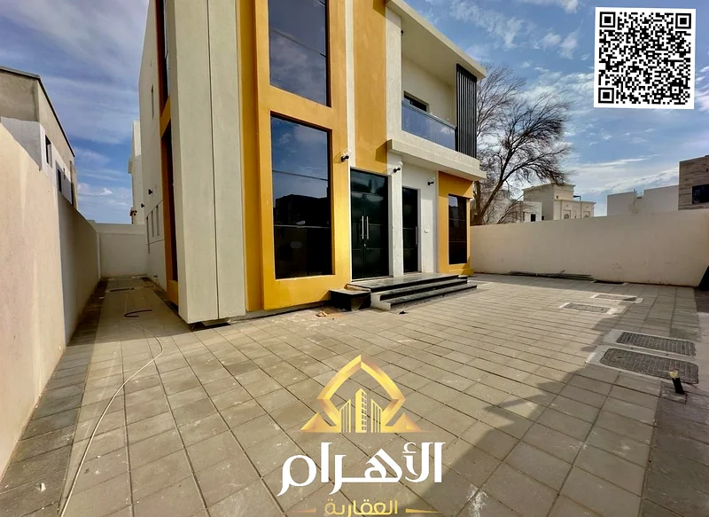 For sale, a villa in Ajman Al Zahya, including fees, 3 master bedrooms, a majlis, a hall, a maid’s room, 5 bathrooms, freehold for all nationalities,63906520714114113
