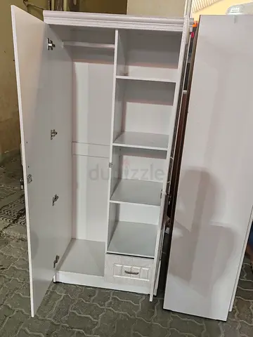 Stylish White Wardrobe with Mirror and Ample Storage