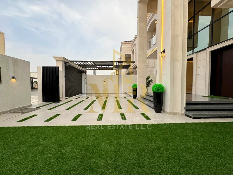 Classic villa with two floors and a roof in the most prestigious areas of Ajman, large area, freehold ownership for all nationalities, including regis63882119006082111