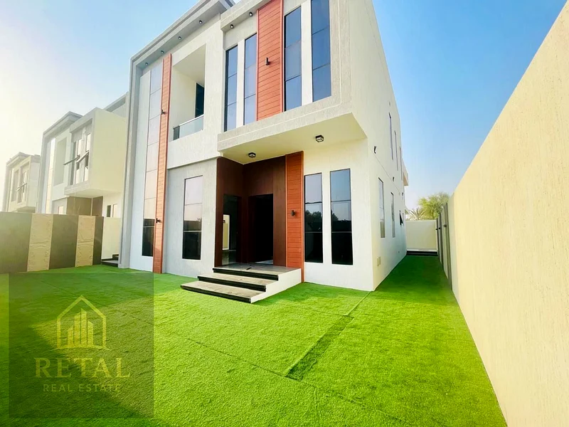 Modern and luxurious villa for sale in Al Helio 1, located in a prime area next to Emirati villa communities63892581586562112
