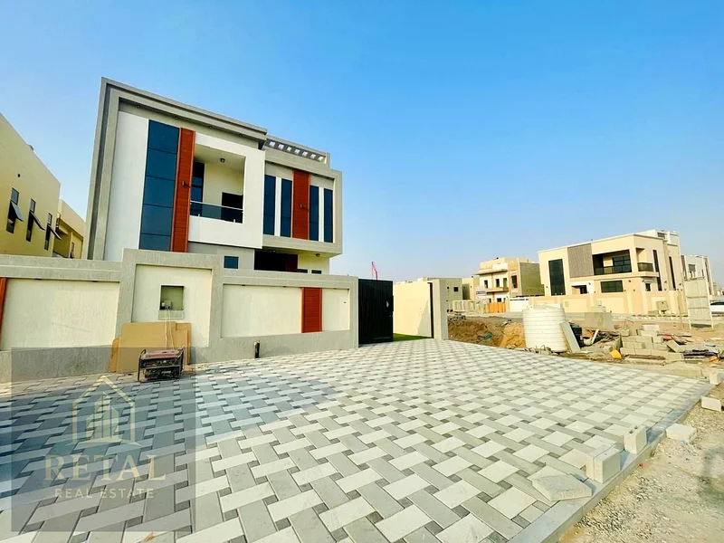 Modern and luxurious villa for sale in Al Helio 1, located in a prime area next to Emirati villa communities63892581586562111