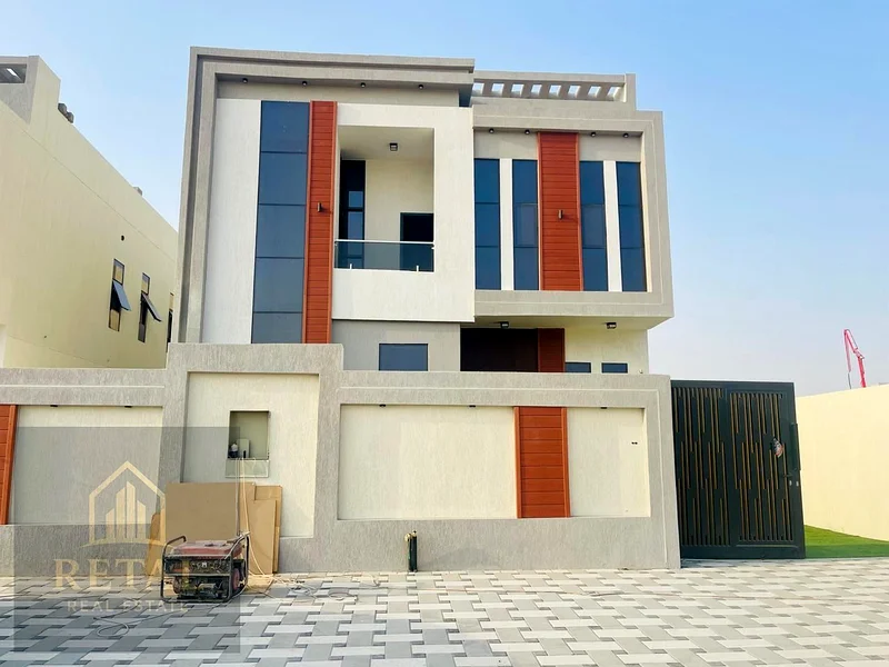 Modern and luxurious villa for sale in Al Helio 1, located in a prime area next to Emirati villa communities63892581586562110