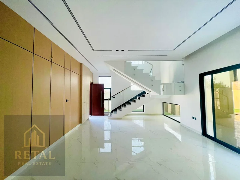 Modern and luxurious villa for sale in Al Helio 1, located in a prime area next to Emirati villa communities63892581586562114