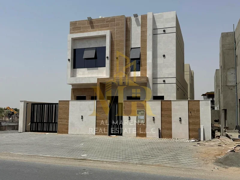 A villa at a price that includes registration and ownership fees on the main street, ready for living in the finest areas of Ajman, freehold ownership63906123987203111