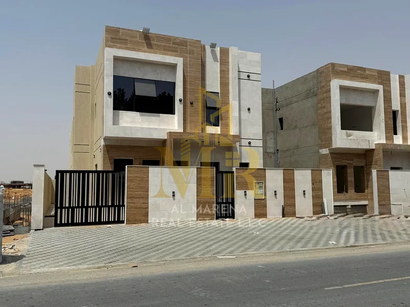 A villa at a price that includes registration and ownership fees on the main street, ready for living in the finest areas of Ajman, freehold ownership63906123987203112