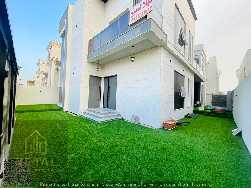 Brand new luxury villa in Al Alia Ajman with modern design, 5 master bedrooms, private pool, waterfall, 2 kitchens, and ample parking spaces63872690805121111