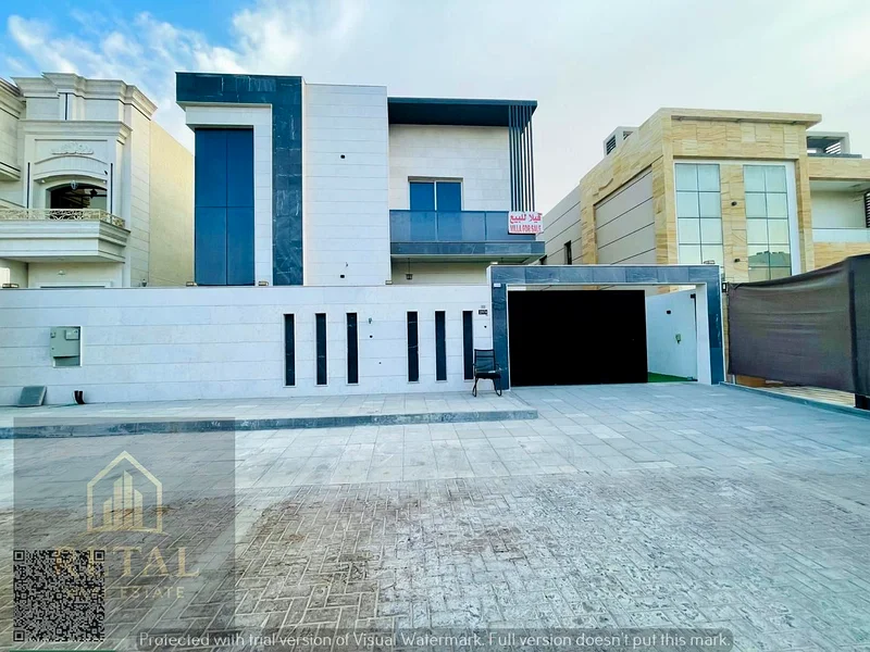 Brand new luxury villa in Al Alia Ajman with modern design, 5 master bedrooms, private pool, waterfall, 2 kitchens, and ample parking spaces63872690805121110