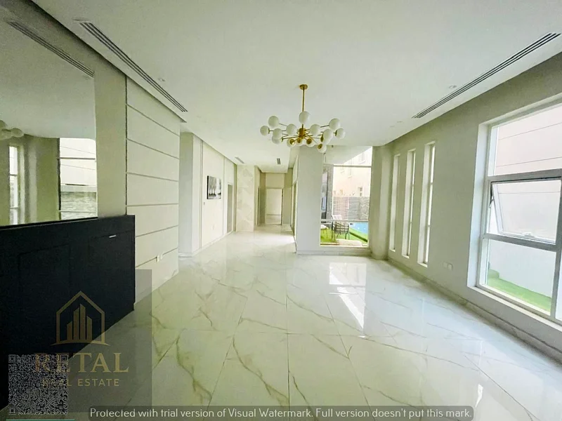 Brand new luxury villa in Al Alia Ajman with modern design, 5 master bedrooms, private pool, waterfall, 2 kitchens, and ample parking spaces63872690805121114