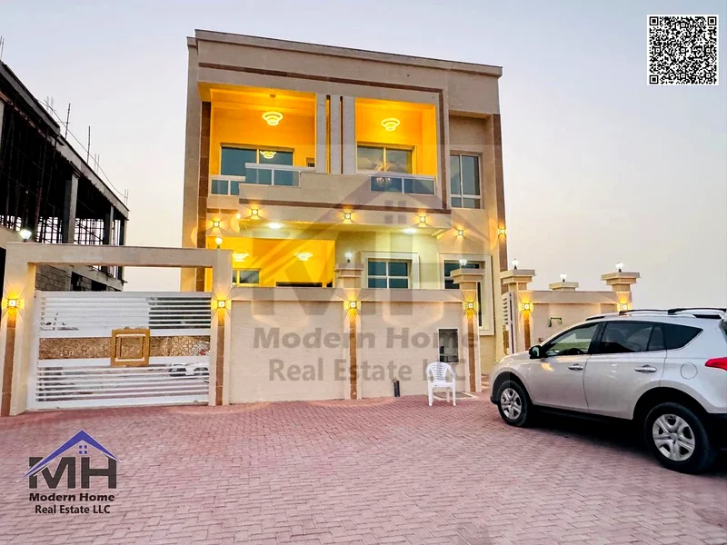 At a price including electricity and water connection, own an elegant villa in Ajman. The first resident, freehold large setback in front of the villa63907043851649111