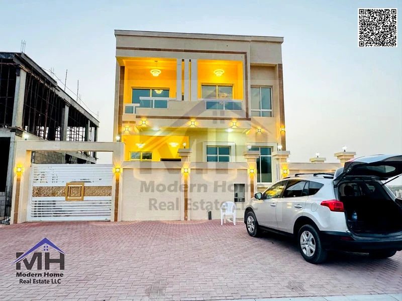 At a price including electricity and water connection, own an elegant villa in Ajman. The first resident, freehold large setback in front of the villa63907043851649110