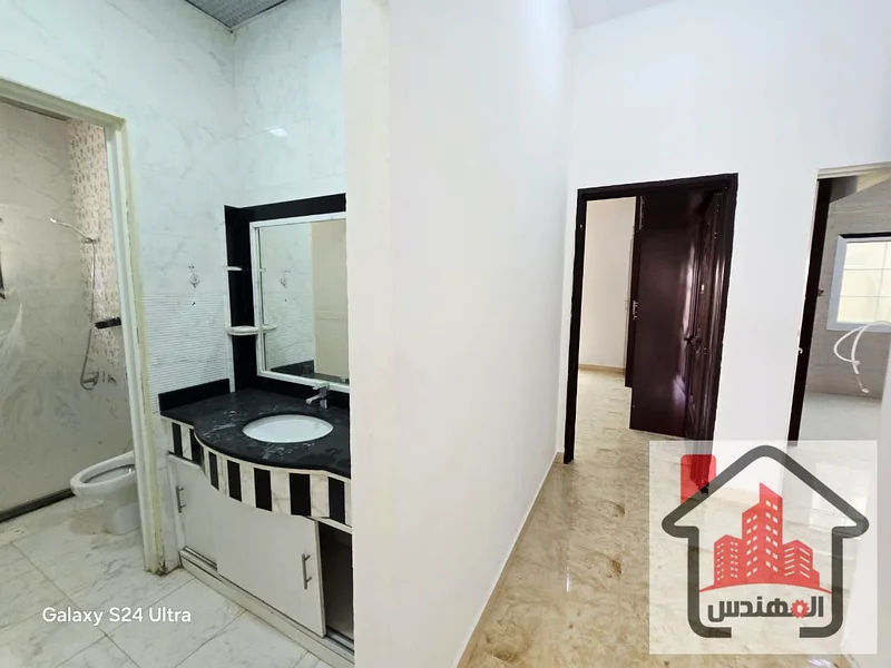 Partition villa for rent in al rawda1 ajman.  Ground floor 2 bedroom hall and 2 kitchen.  Yearly 55,000 AED.  1st floor separate.  There is 3 bedroom hall 2 washroom and kitchen.  Yearly 60,000 AED. ف63722633914114112