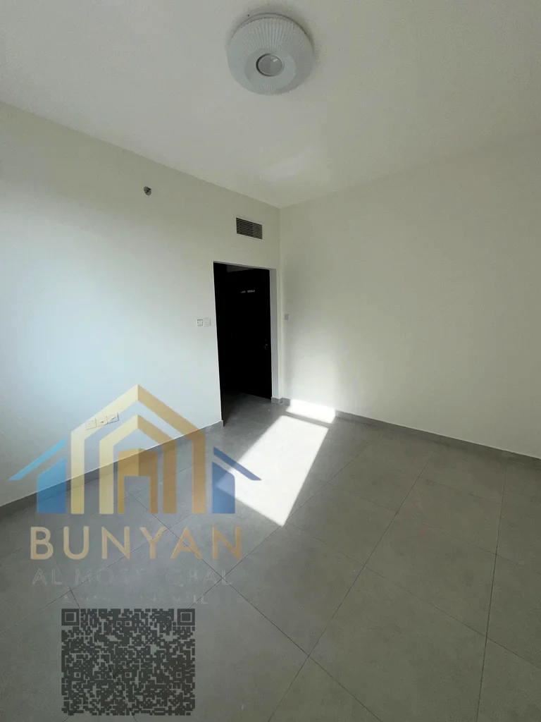 🔑 الكود 301 | شقة فاخرة للإيجار السنوي في الحميدية 1 – عجمان 🏢✨  📍 الموقع: تقع هذه الشقة الأنيقة في الحميدية 1، عجمان،63709402803585110