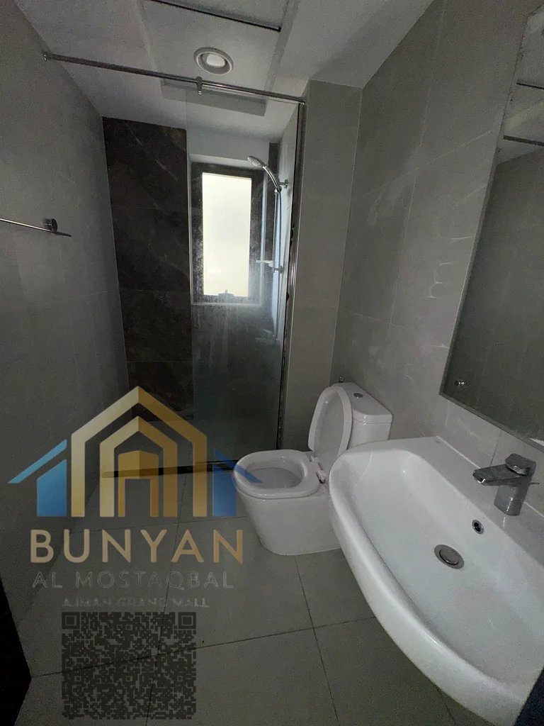 🔑 الكود 301 | شقة فاخرة للإيجار السنوي في الحميدية 1 – عجمان 🏢✨  📍 الموقع: تقع هذه الشقة الأنيقة في الحميدية 1، عجمان،63709402803585113