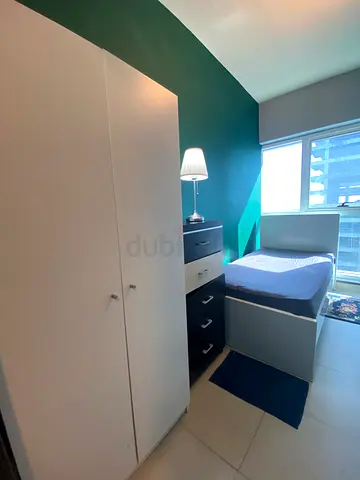 Room with open window in JLT near DMCC metro
