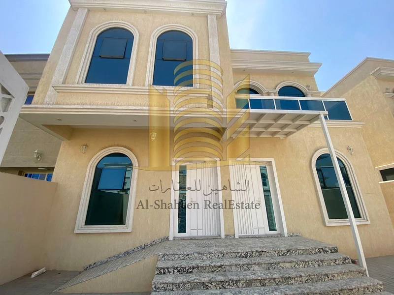 New two-storey villa for rent in Ajman  The bright area  Asphalt Street  Consists of:  5 master rooms + council + hall  Dressing + Indoor Preparatory Kitchen  Large outdoor kitchen  Maid room with bat63710612854018111