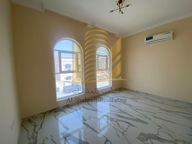 New two-storey villa for rent in Ajman  The bright area  Asphalt Street  Consists of:  5 master rooms + council + hall  Dressing + Indoor Preparatory Kitchen  Large outdoor kitchen  Maid room with bat63710612854018114