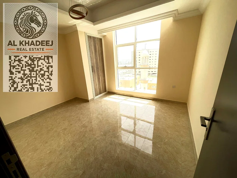 The most beautiful 3 rooms and a hall with a balcony and an open view, Al Rawda 2 area, next to all services, easy access to Dubai and Sharjah63723652860802111
