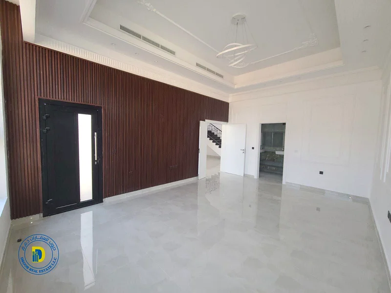 For sale, a modern villa with 5 rooms, including registration fees, Al Helio 2 area, Ajman, super deluxe finishing, freehold, bank financing63907700861314112