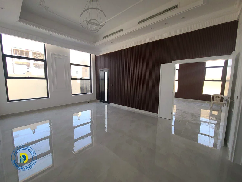 For sale, a modern villa with 5 rooms, including registration fees, Al Helio 2 area, Ajman, super deluxe finishing, freehold, bank financing63907700861314113